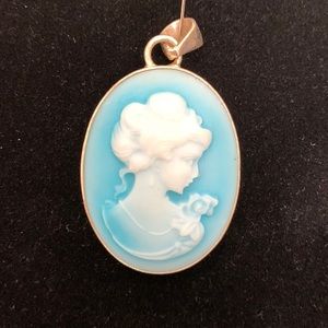 Suite, pendant & French wire earrings- blue Cameos facing their left.